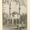 Mosque of the Tekîyeh, or Hospice of the Sultan Selim.  Its position is shown in the illustration on page 381. The court is planted with walnut-trees. The cloisters and interior of the mosque are decorated with exceedingly fine glazed tiles.