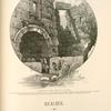 Entrance to the ruins of Ba'albek.  At the south-west corner, through a long vaulted passage like a railway tunnel under the great platform. Two of these great vaults run parallel with each other, from east to west, and are connected by a third running at right angles to them from north and south.