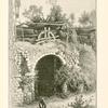 A water-wheel (sâkiyeh) on the canal.  When the creaking wooden wheels are in motion the earthenware jars, strung to ropes made of palm fibre, revolve, alternately dripping into the water and emptying themselves into a trough connected with a reservoir.