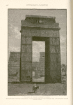 The gate of Ptolemy Euergetes, Karnak.  Showing the pylon of the Temple of Khons beyond.  An avenue of rams leads up to this beautiful gate, which is the most gracely of all the structures at Karnak.