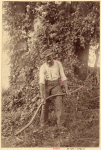 Man grasping a scythe