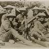 American Infantrymen who have captured a machine-gun