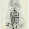 Boy in winter coat with a sled