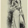 An ascot gown of striped taffetas and muslin