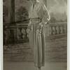 Woman in skirt, hat, and white blouse, 1920s