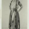 Woman in striped dress, ca. 1921