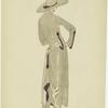 Back view of a woman in a dress and hat
