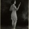 Woman in undergarments, ca. 1921