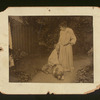 Sarah Bernhardt with a young girl and a dog in a garden