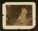 Sarah Bernhardt with a young girl and a dog in a garden