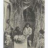 Women and children preparing sugar cane.