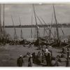 Feed boats (trodden straw) unloading on the Nile, Egypt.