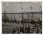 Feed boats (trodden straw) unloading on the Nile, Egypt.