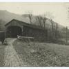The Covered Bridge on a Country Highway.