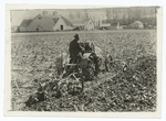 A Gang Plow with Tractor.