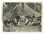 Custer, his officers, and their families, in camp.