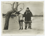 An Eskimo with his Prize Reindeer.