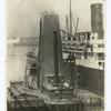 Loading grain on the Aquitania.