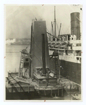 Loading grain on the Aquitania.