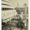 Raising cargo from the hold.