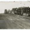 Thomas automobile driven by George Saltzman crossing the railroad bridge on Elliston Road in Westbury.