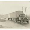 Transporting automobiles by truck.
