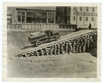 Dirt truck ascending a ramp.