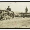 Fordson tractor pulling a scraper.