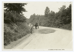 Patrolman repairing a gravel road in Maryland.