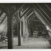 Interior of "Old Farm" (1683), 2nd attic - left hand half, see the solid oak beams - held together by wooden pegs. Spinning wheels & reels - wooden platform scale - etc -