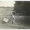 Man harvesting with a cradle