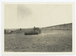 Field with bale of hay