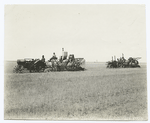 Mechanical tractors in use on farm