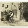 Man seated at desk