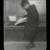 Fordham, boy reading on bench