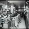George Bruce interior views, children visiting circulation room, no children's room, children's books on front shelves, east wall