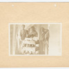 Men around book cart