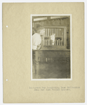 Immigrant boy inspecting loan collection from New York Public Library