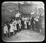 Sunday school after a visit to Chatham Square, showing Chinese children lined up by size