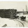 Hauling a Mountain of Logs.