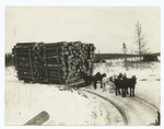 Hauling a Mountain of Logs.