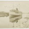 Steamer moving along waterway (Cape Cod Canal?)