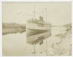 Steamer moving along waterway (Cape Cod Canal?)