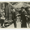 Arrival of the train and descent of the passenger.