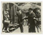 Arrival of the train and descent of the passenger.
