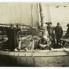 Fishermen on an icy boat
