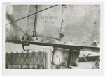 Two parachute flares installed in each ship projecting under fusilage.