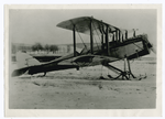 Air mail plane equipped with snow shoes.