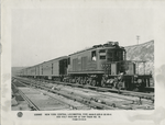 New York Central locomotive, type 4444-E-225-8 GE-89-A 600 volt hauling 12 car train no. 16.