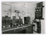 A modern Marconi ship's 1? KW installation including a continuous wave valve transmitter; wireless direction finder; 4 electrode valve amplifier and tuner; quenched spark transmitter; emergency spark transmitter.
